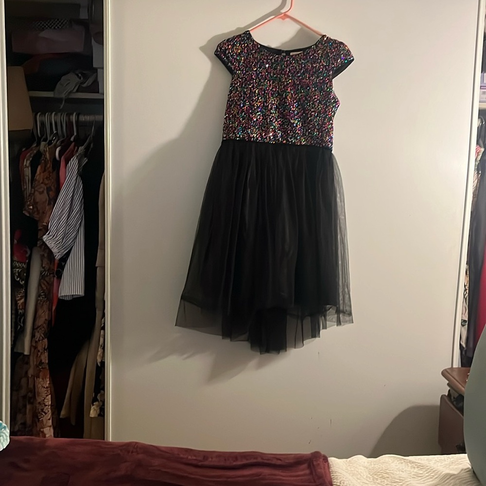 Is the dress from my daughter but she is. Grownup she love the dress